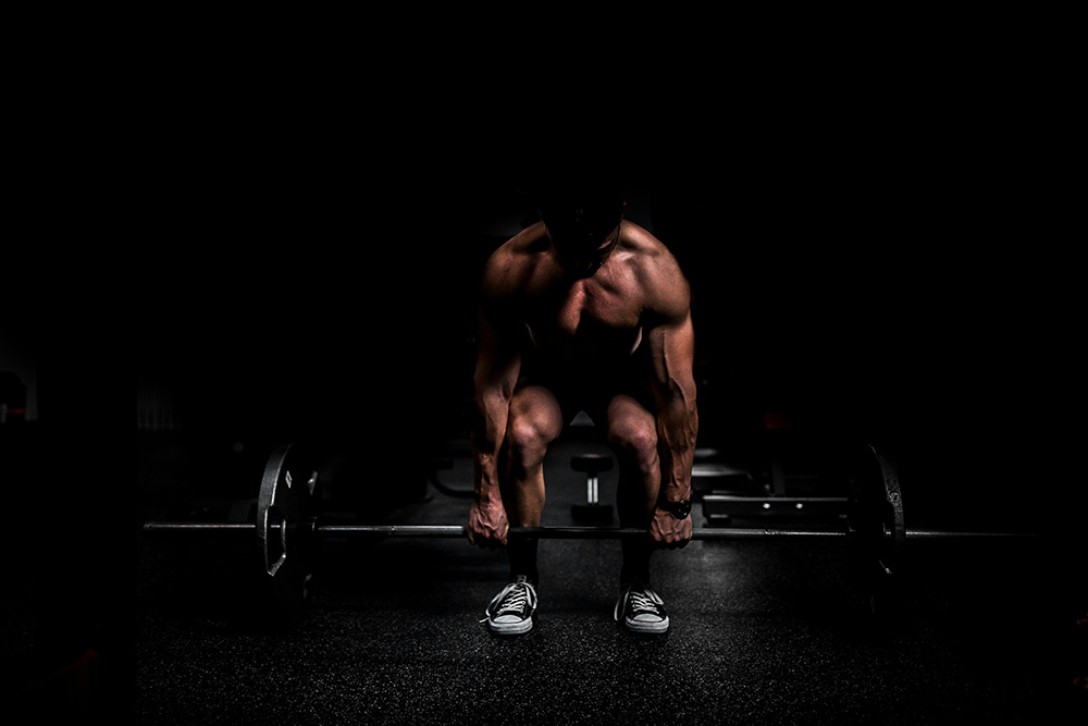 Bodybuilder lifting a barbell